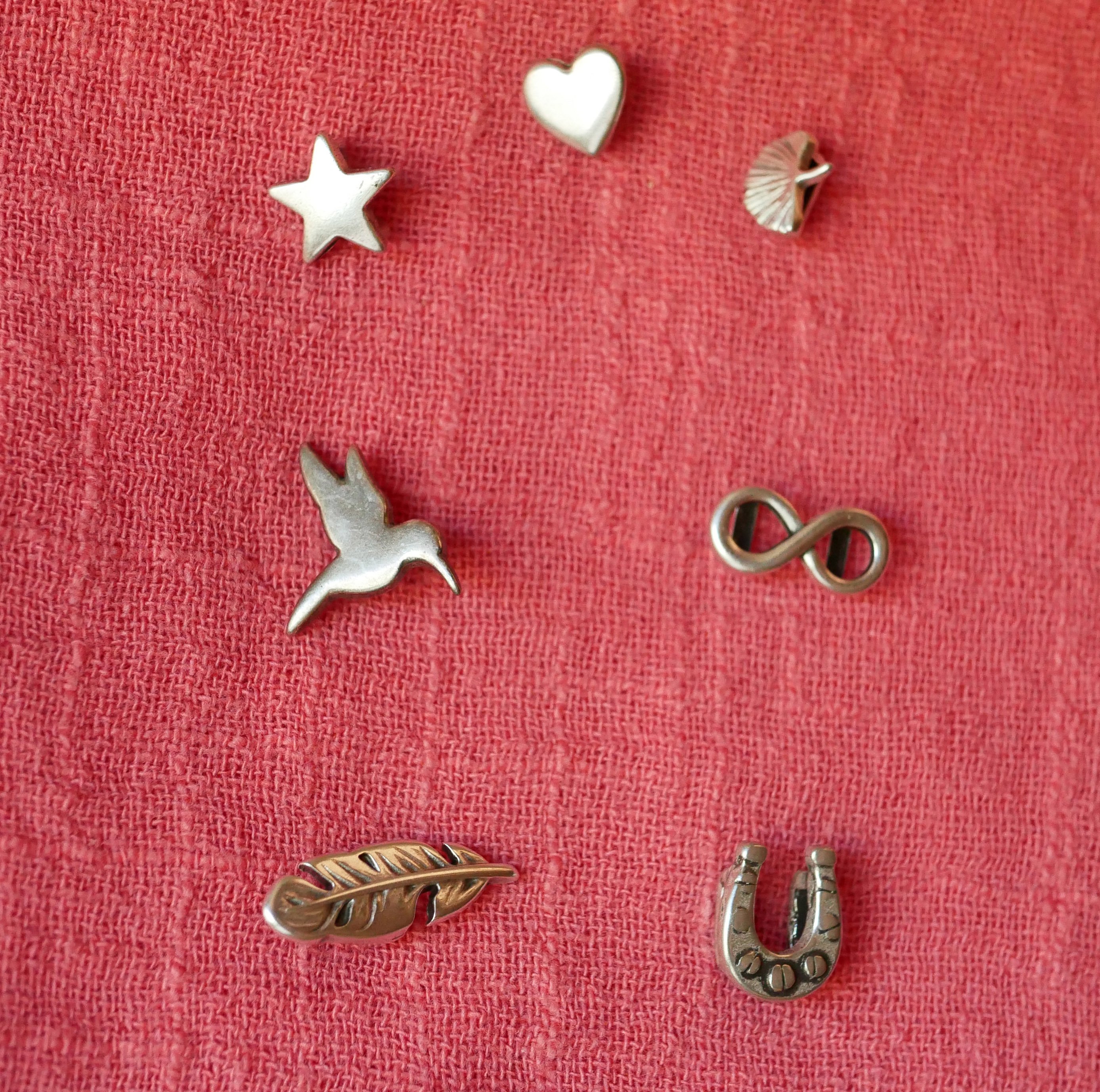 Manschettenarmband aus t&uuml;rkisem und braunem Multi-Leder mit 2 silbernen Schlaufen