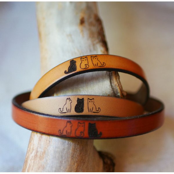 Trio von Lederarmb&auml;ndern personalisiert durch Gravur mit Designs nach Wahl